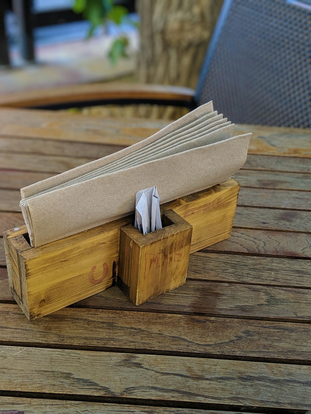 brown tissue in wooden box