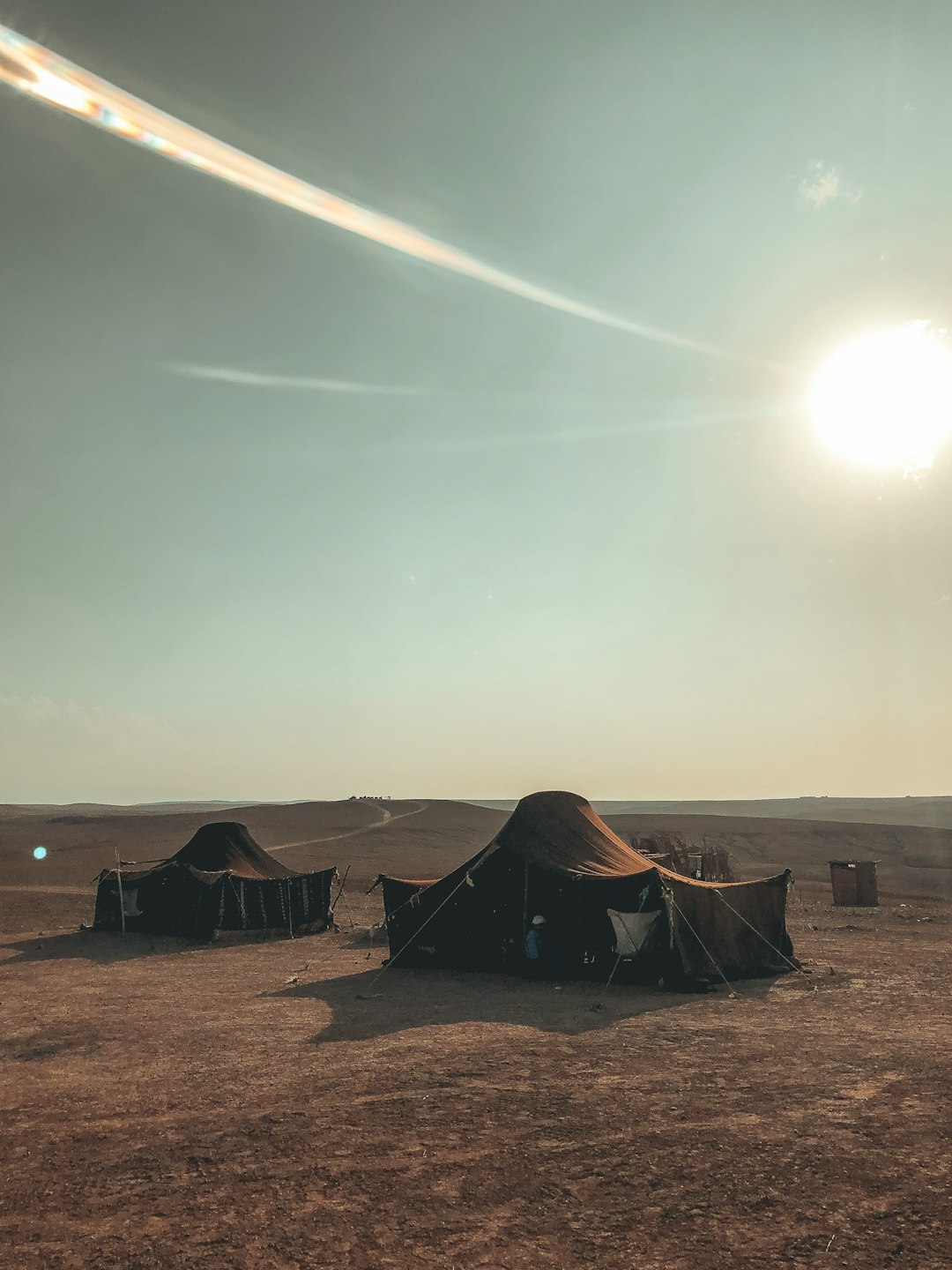 black tents under blue sky