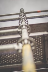 macro photography of gray stainless steel rods