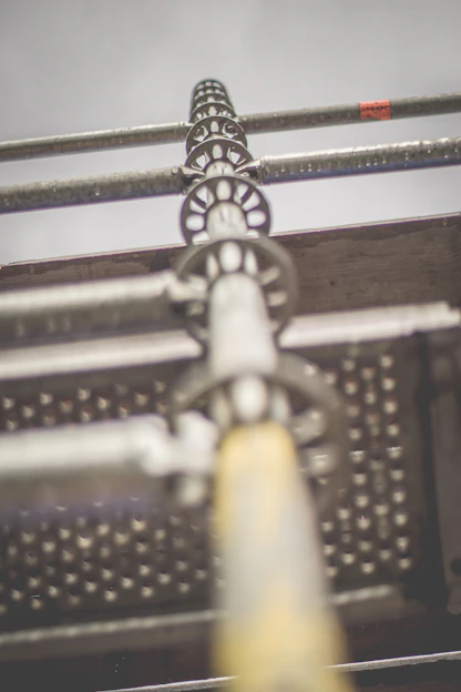 macro photography of gray stainless steel rods