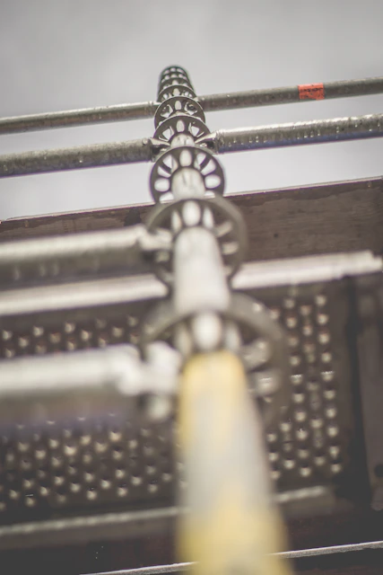 macro photography of gray stainless steel rods