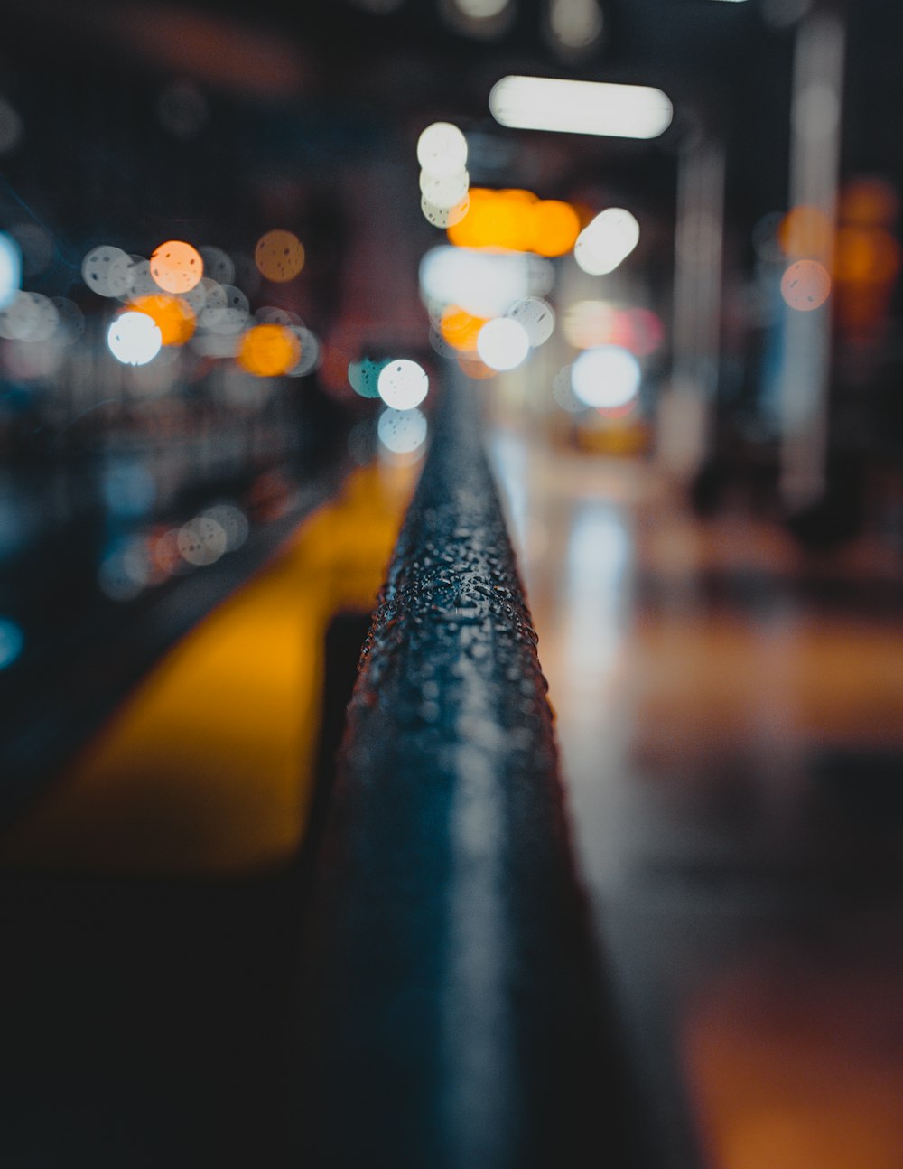 a blurry photo of a city street at night