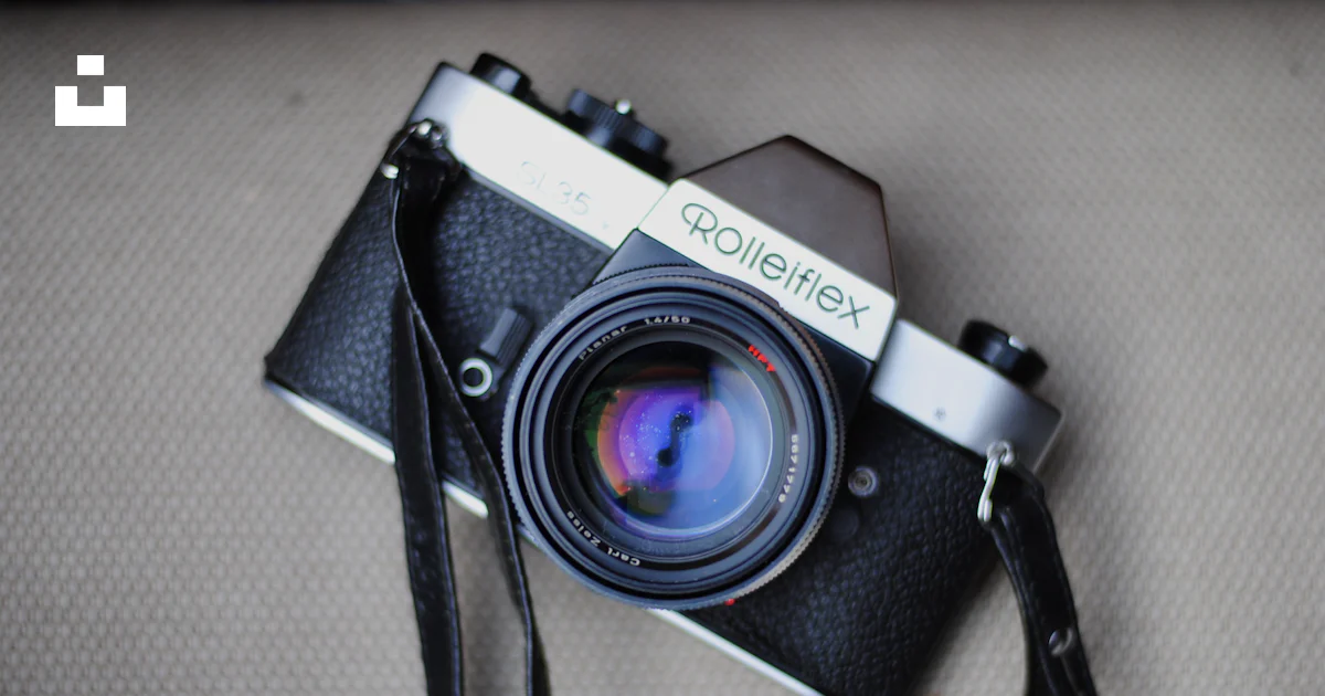 Grey Cameradslr Black and gray DSLR camera photo – Free Strap Image on Unsplash
