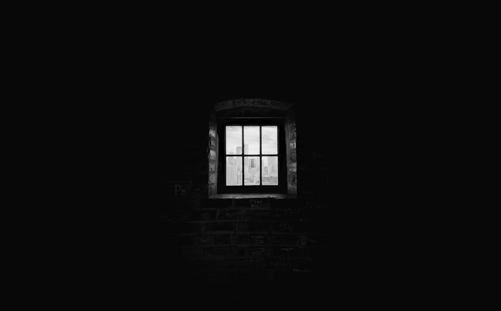 greyscale photography of window