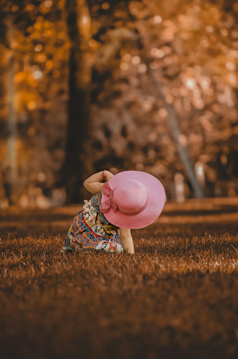 girl wearing pink hat