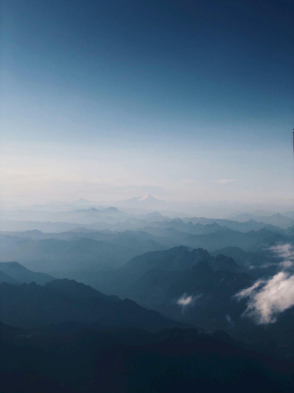 a view of a mountain range from an airplane