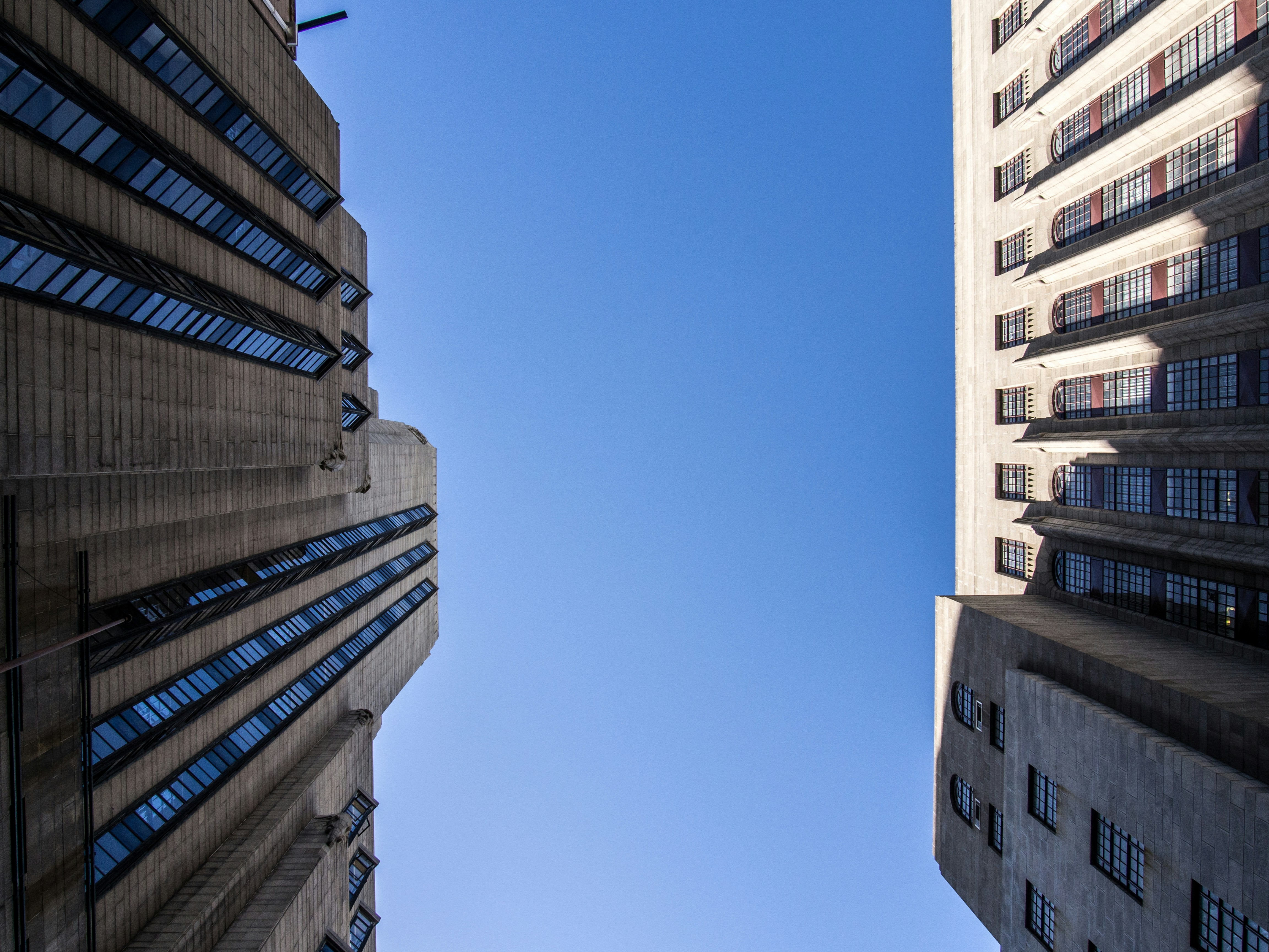 two white high-rise buildings