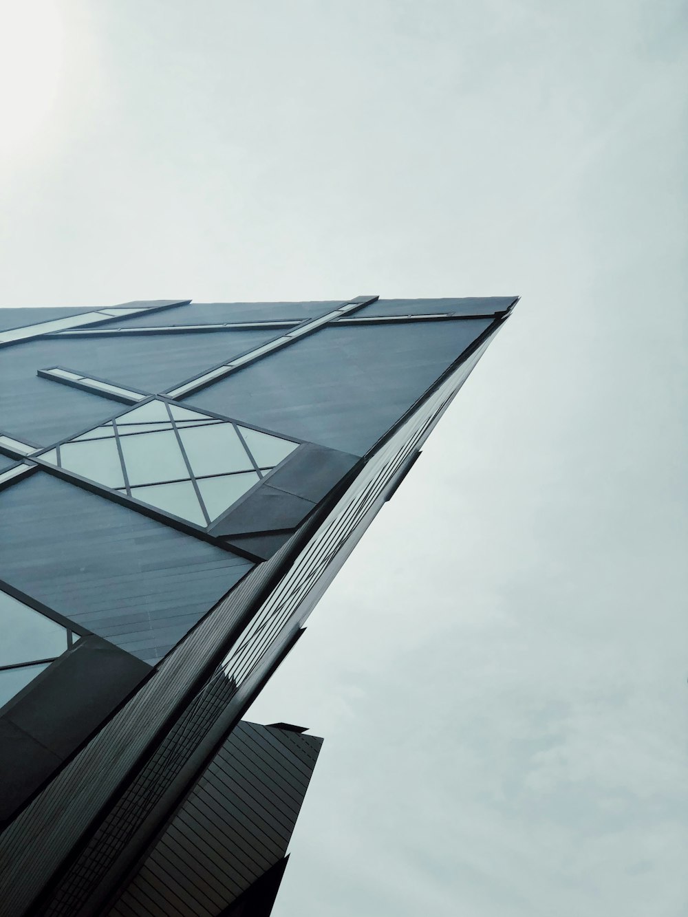 a tall building with lots of windows on top of it