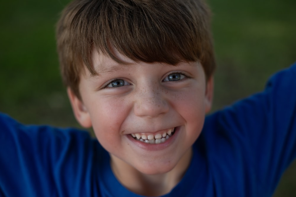 boy's blue crew-neck shirt