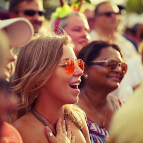 woman wearing red sunglasses