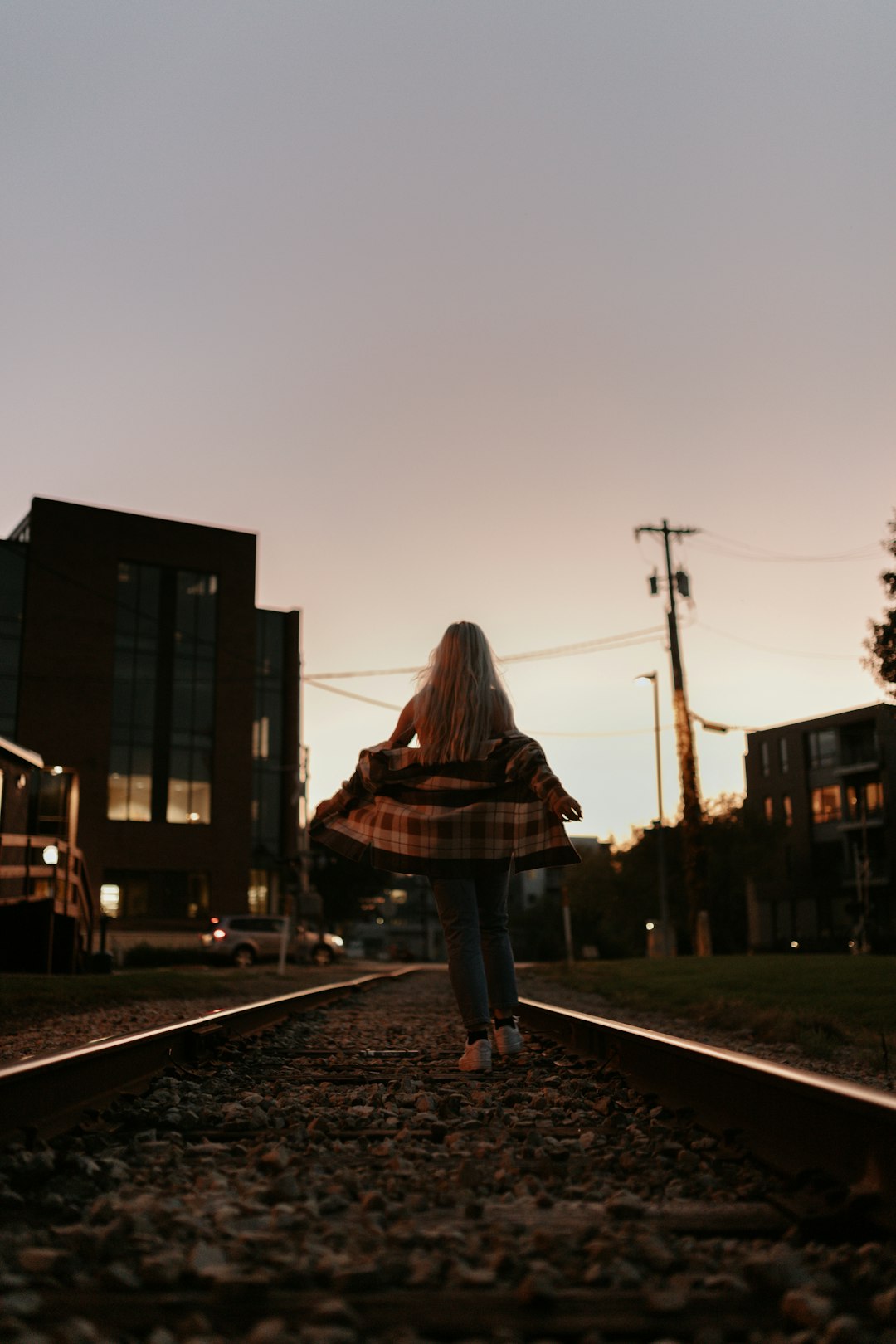 woman in train track