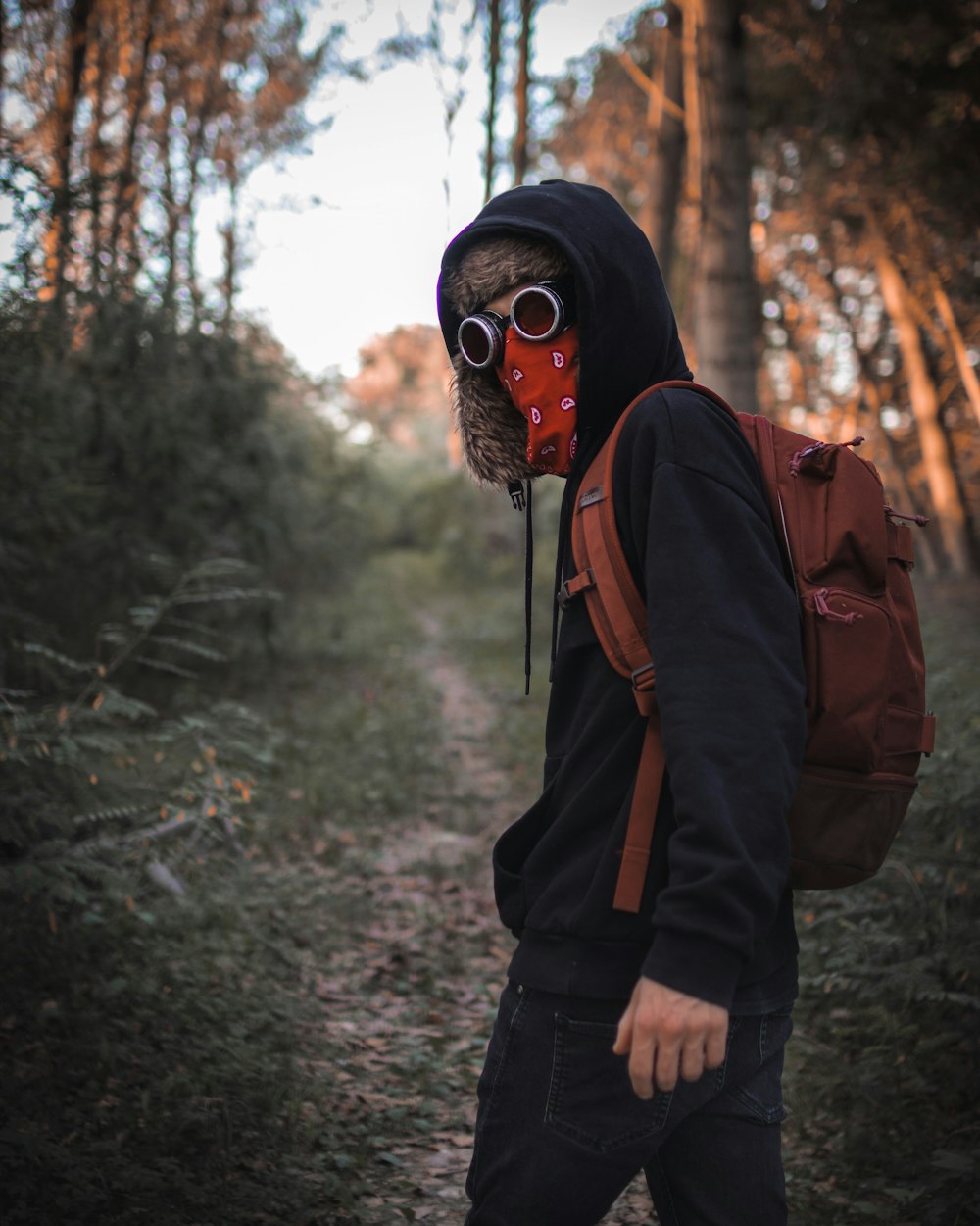 man wearing black hoodie during daytime