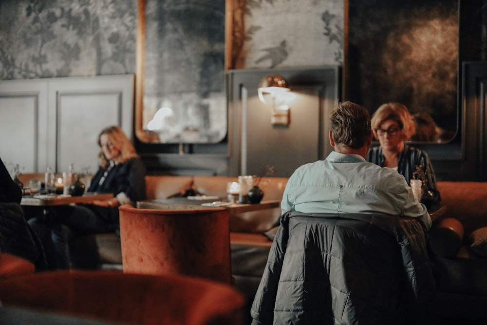 unknown persons sitting indoors