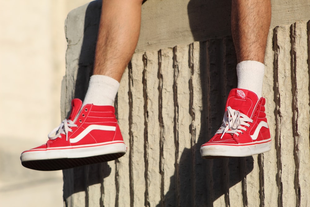 Person wearing red vans high-top sneakers photo – Free Shoe Image on  Unsplash