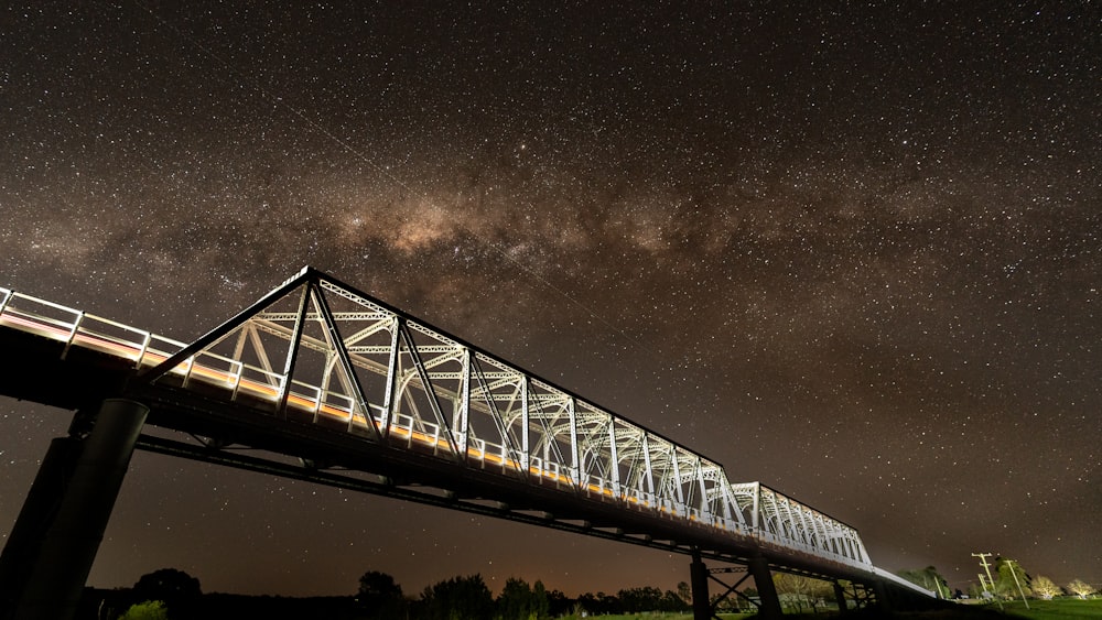 white bridge with light during nighttime