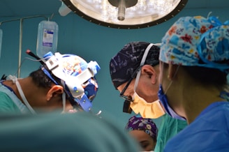 doctors wearing assorted-color scrub shirts