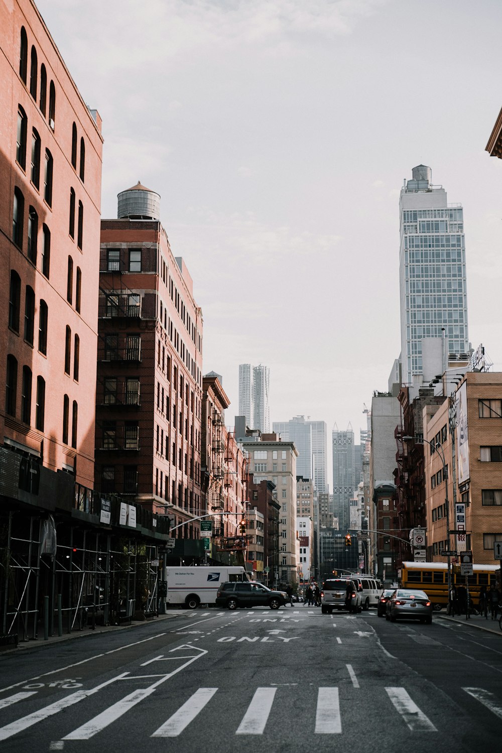 cars and buildings photo during daytime