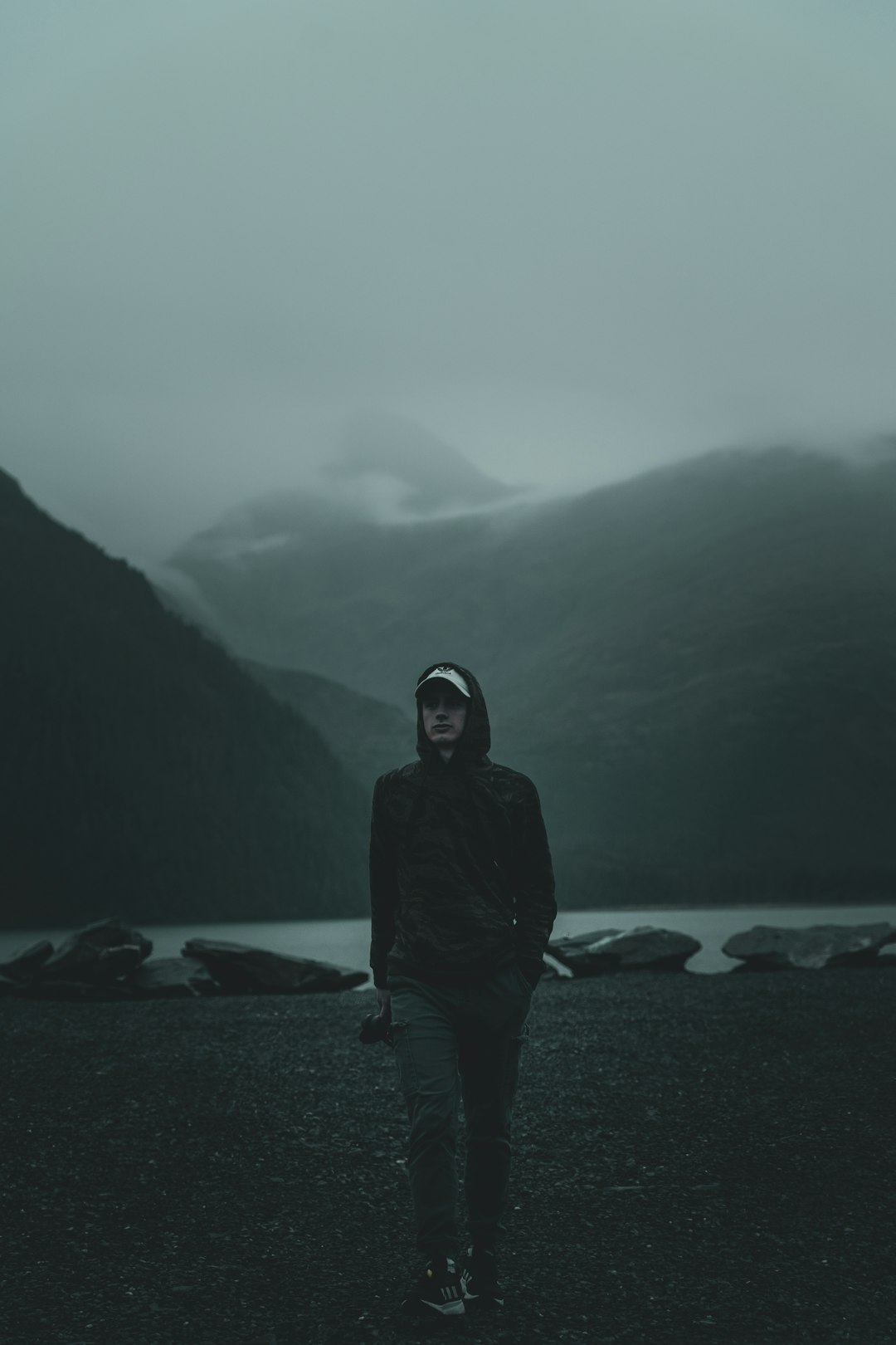 man wearing black jacket