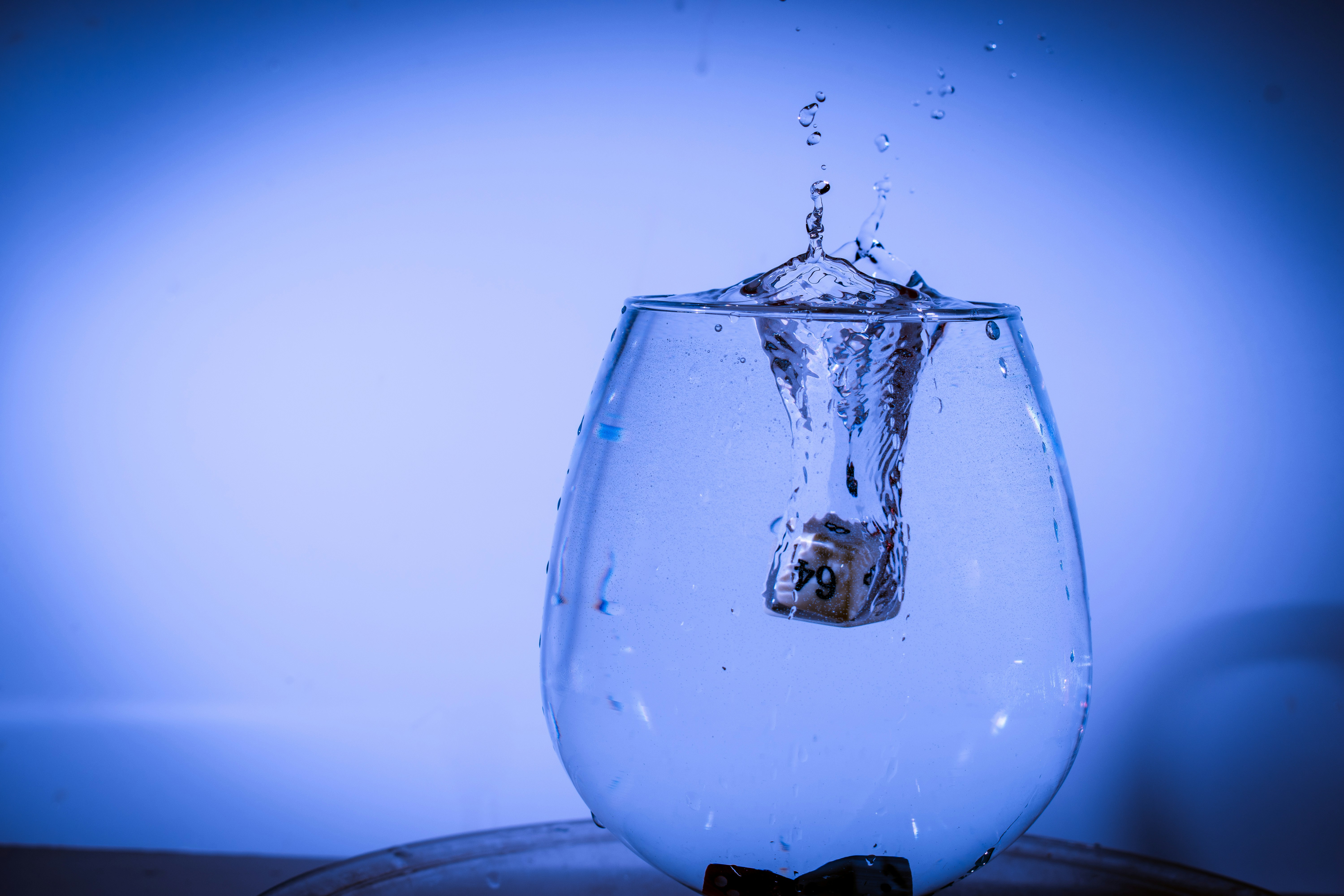 silver ring dipped in water, Splash