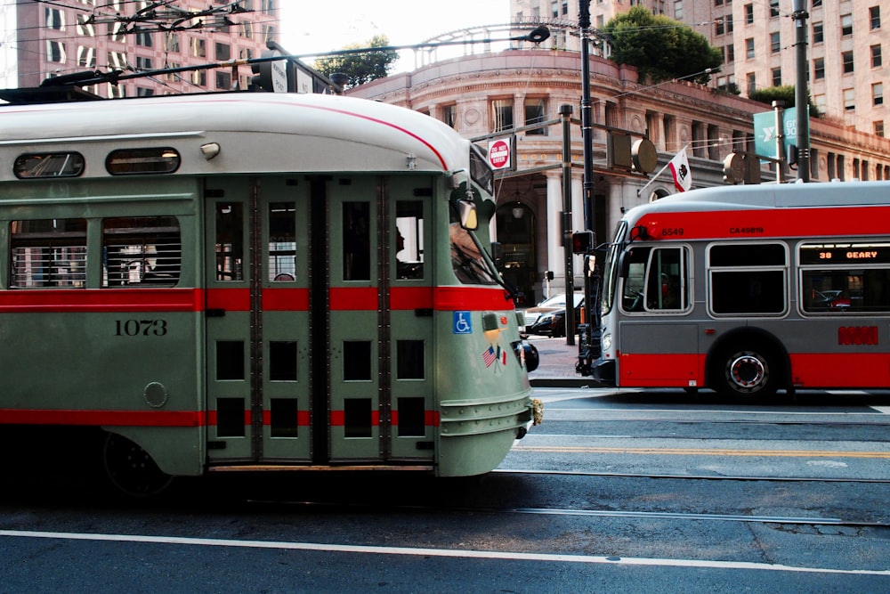 two grey bus on road