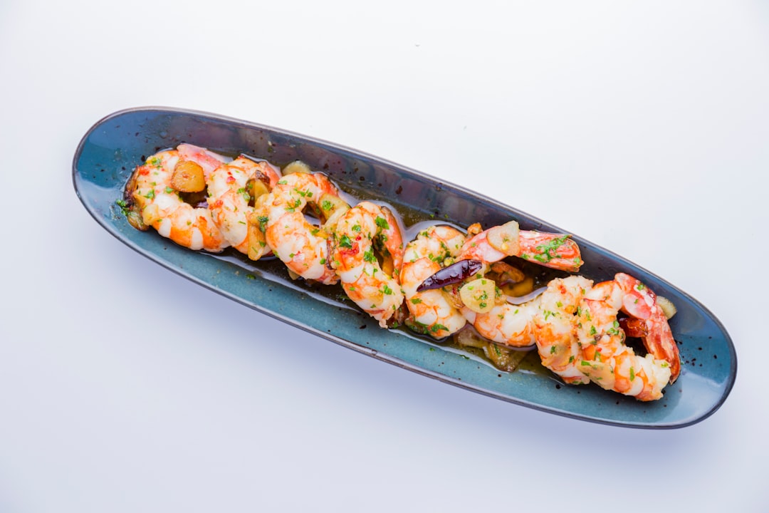 shrimp dish in gray oblong plate