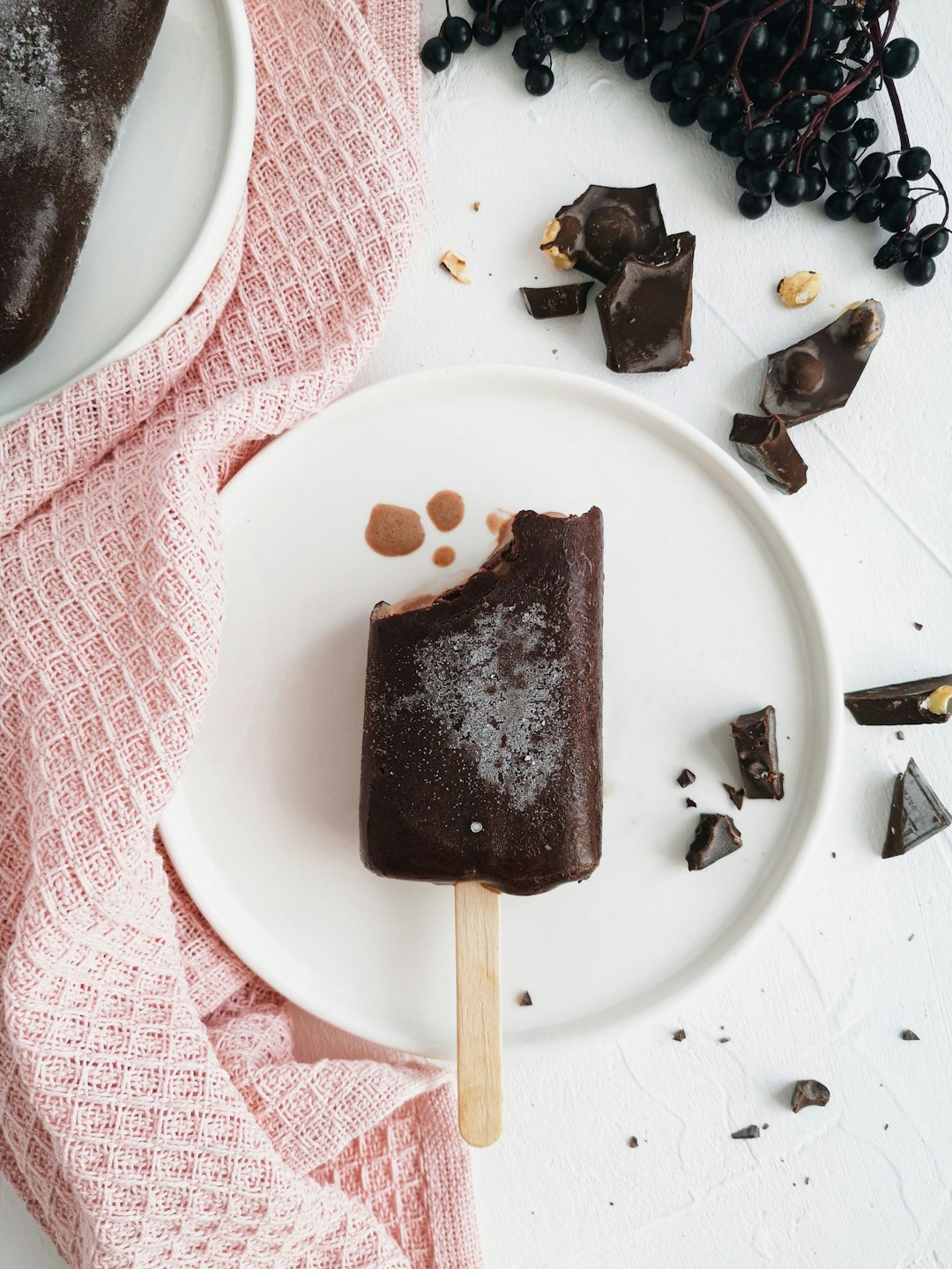 chocolate ice pop on round white plate