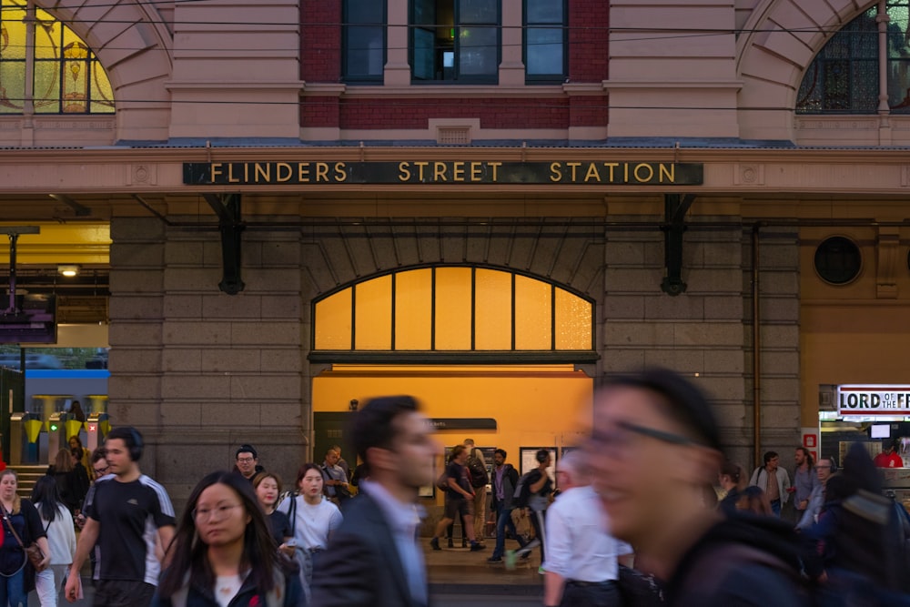 people walking near Flinders Street Station building during daytime