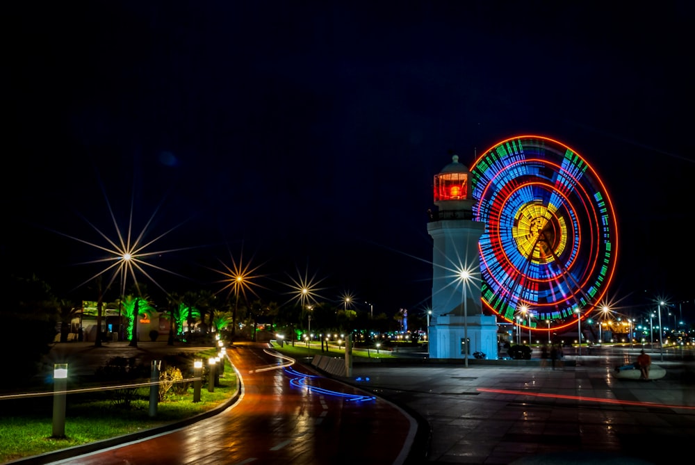 time-lapse photography of amusement park during night time