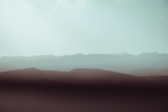 a distant view of a mountain range in the distance