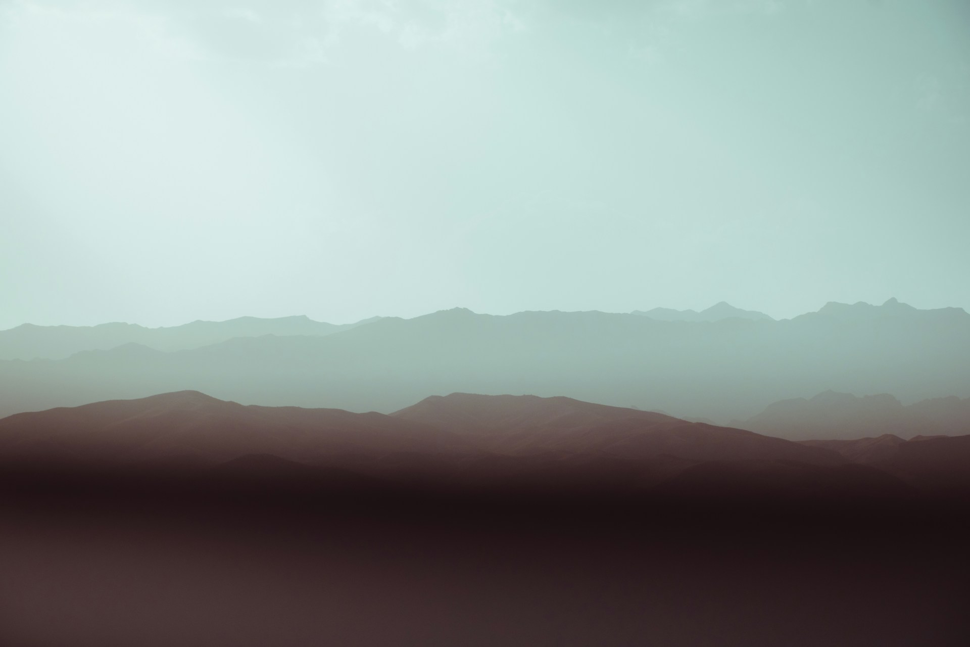 a distant view of a mountain range in the distance