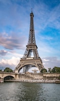 Eiffel Tower, Paris across body of water during daytime