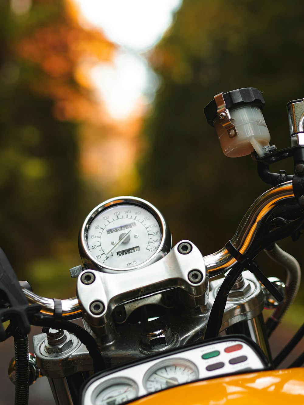 close view of motorcycle instrument panel cluster