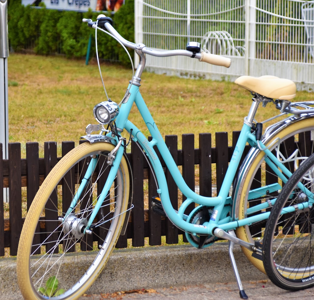 teal beach cruiser bicycle