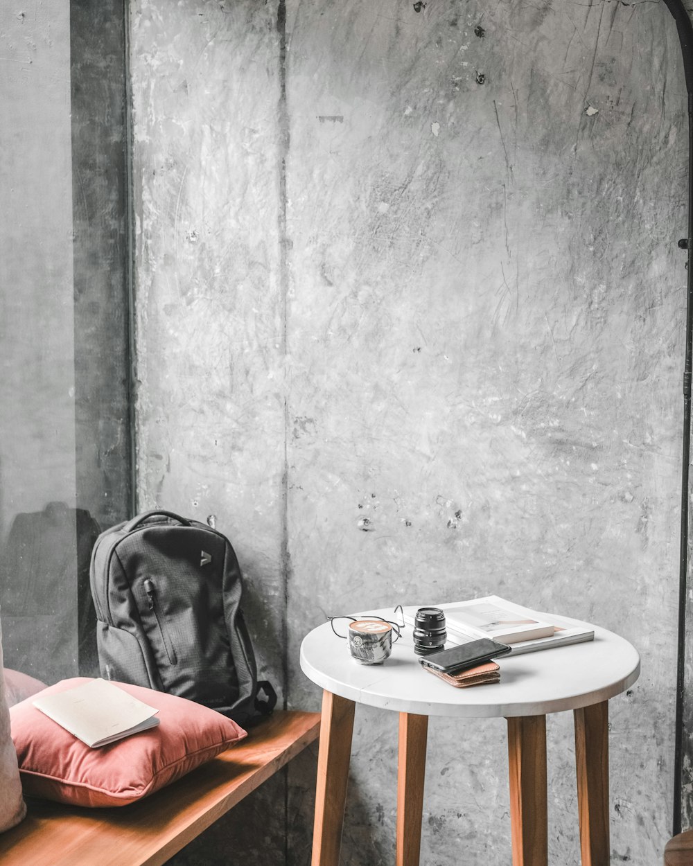 black backpack on brown wooden table