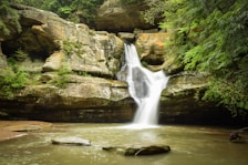 A picturesque view of Soochipara Waterfalls cascading down rocky cliffs.