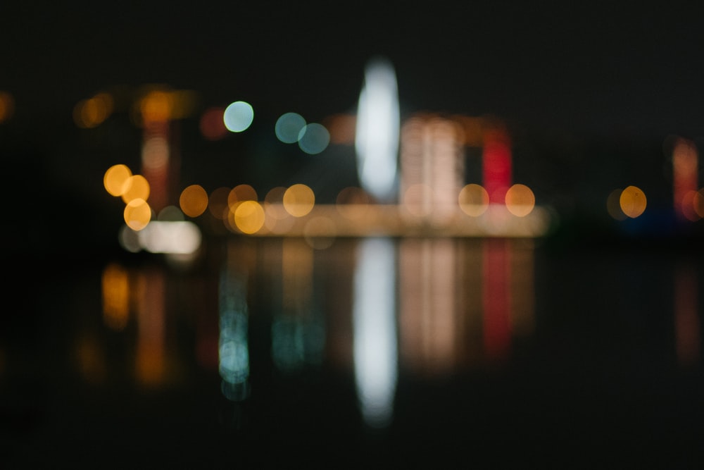 a blurry photo of a city at night