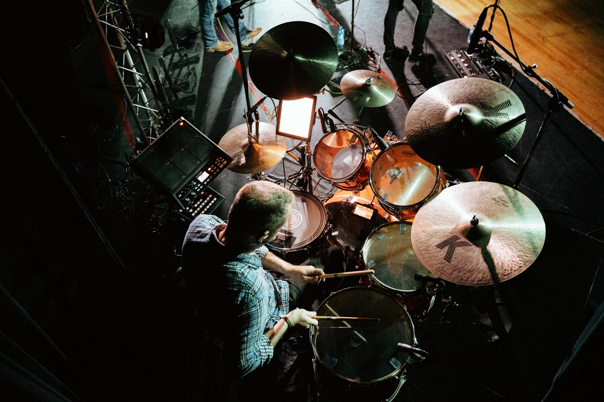 man playing drum set