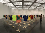 Grid view of baseball uniforms showcasing clean lines and premium material under soft lighting.