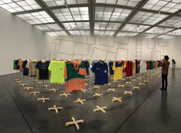 A vibrant display of memorabilia from NFL, NBA, and NHL teams arranged in a collector’s room.