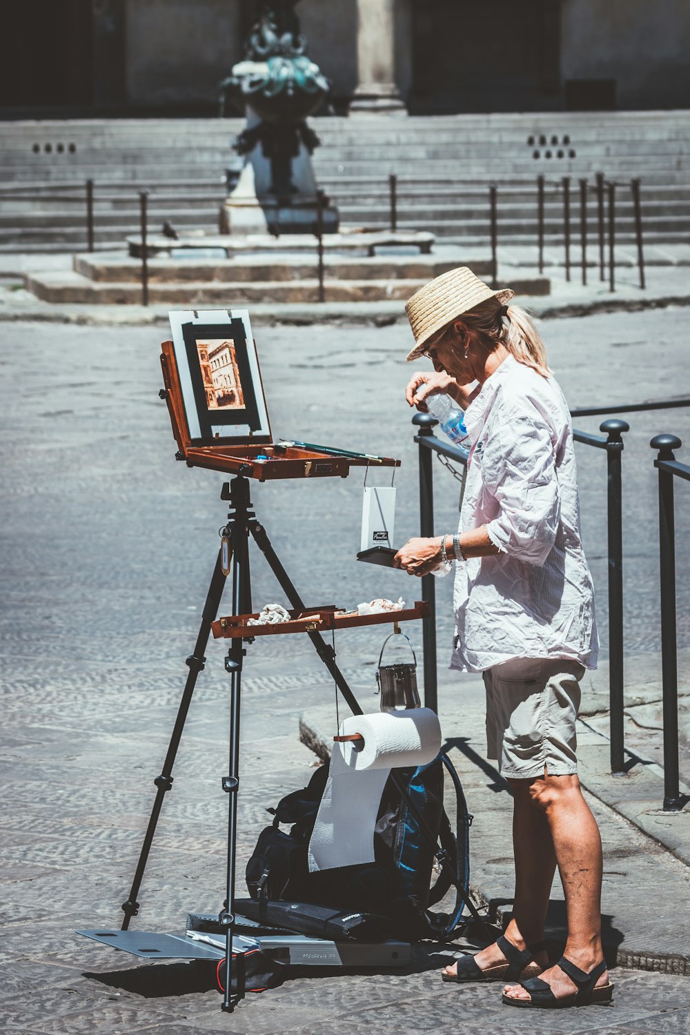 man standing beside monitor