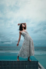 woman standing on tiled surface