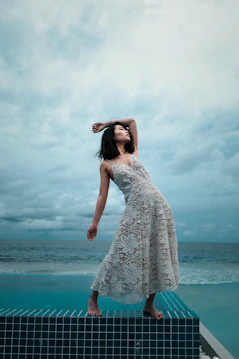 woman standing on tiled surface