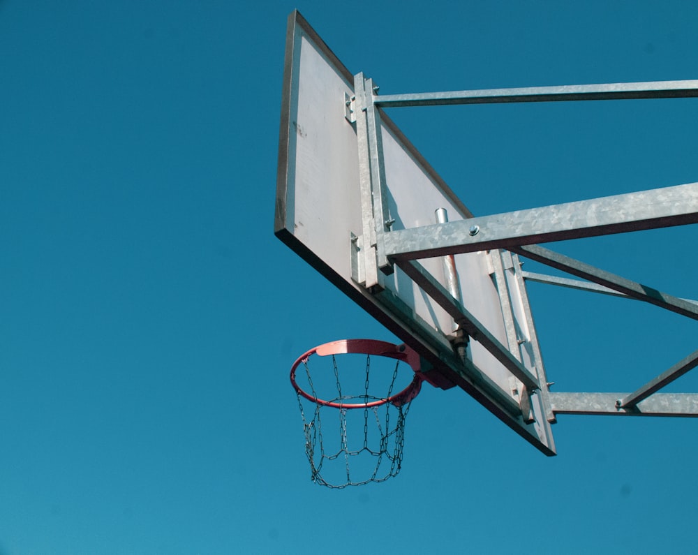 gray metal outdoor basketball hoop during daytime