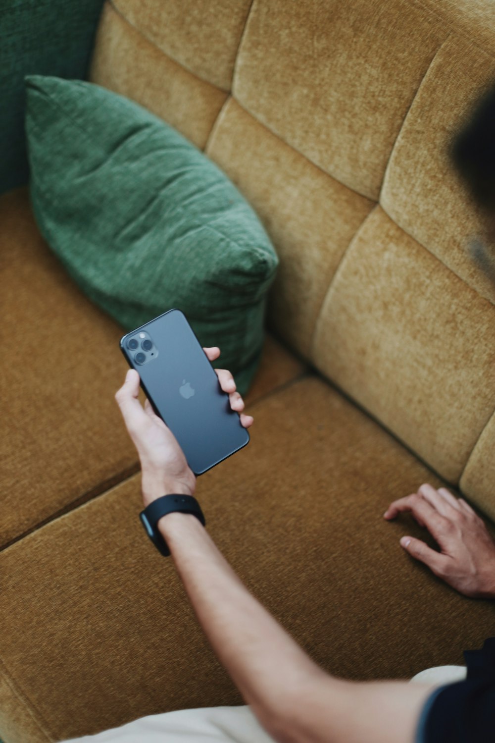 person holding black iPhone