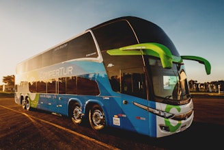 parked blue and black Compertur bus