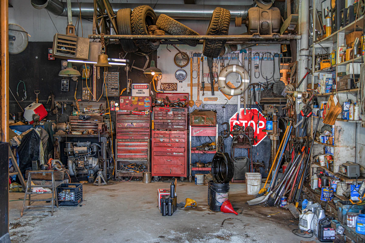 Garage tools organized neatly on a wall-mounted storage system