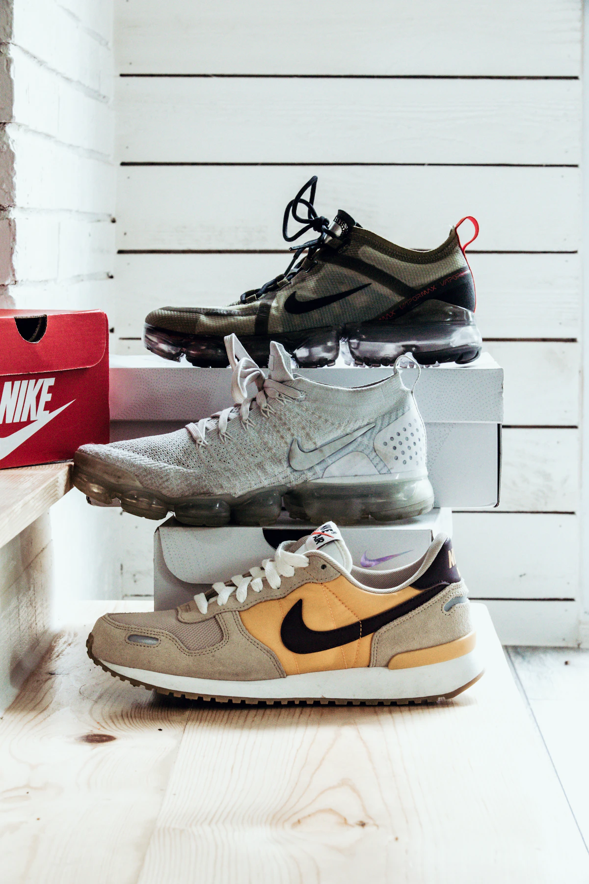 Various modern basketball shoes showcasing different cuts, designs, and outsole traction