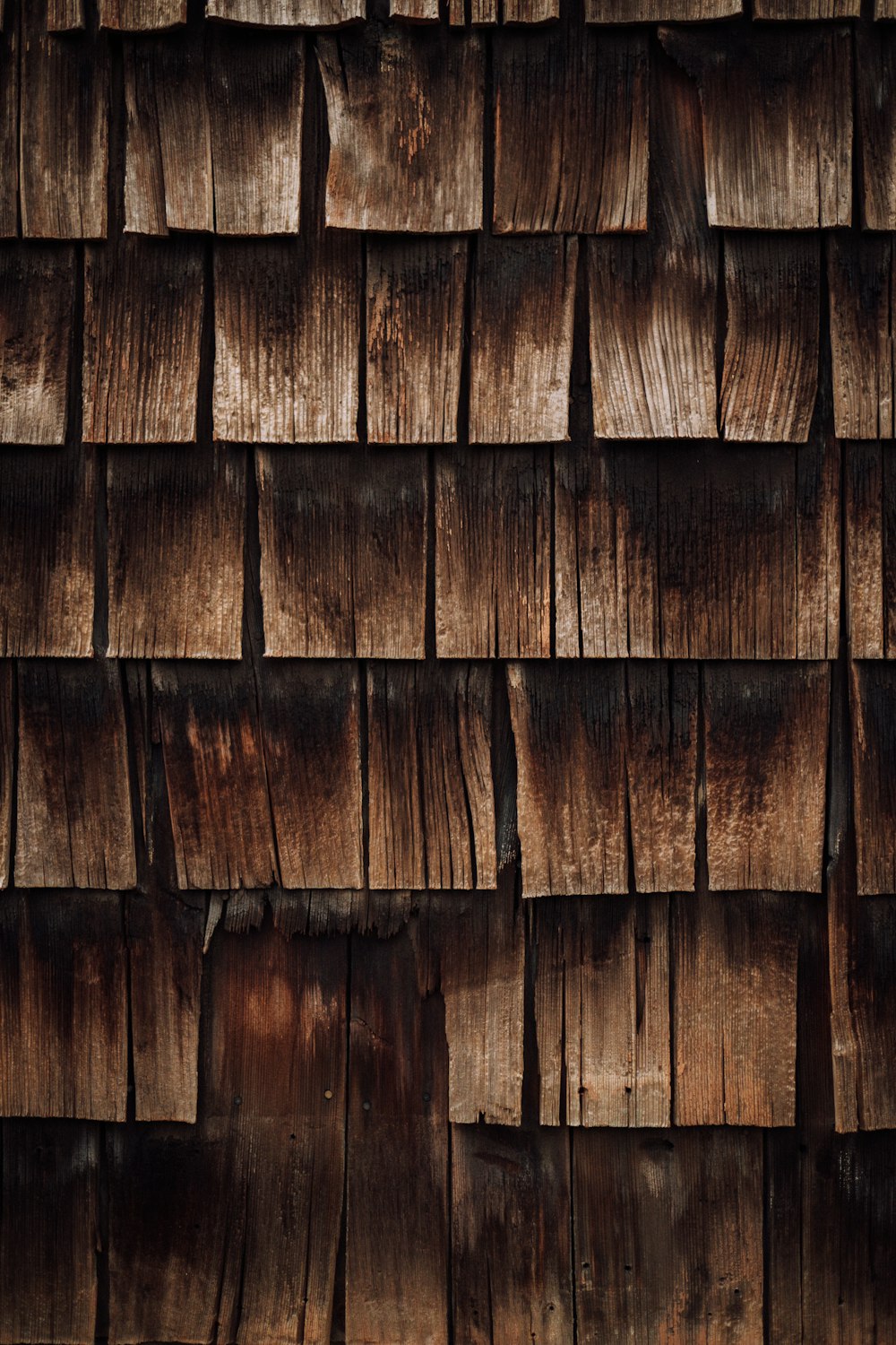 a close up of a wooden wall made of planks