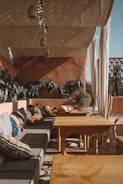 A cozy outdoor patio with comfortable seating.