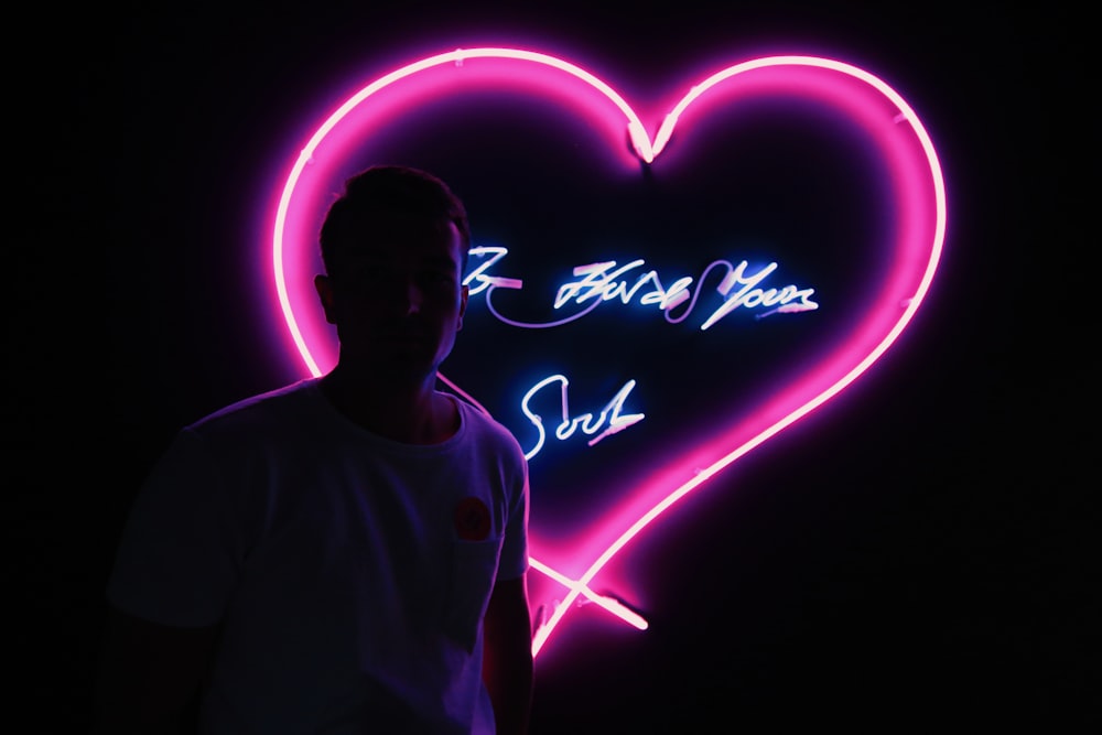 man near heart neon signage